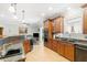 Large kitchen with granite island, stainless steel appliances, and hardwood floors at 1426 Sc-45, McClellanville, SC 29458