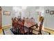 Formal dining room with hardwood floors and a large table at 1426 Sc-45, McClellanville, SC 29458