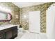Tropical-themed bathroom with a vanity and walk-in shower at 1426 Sc-45, McClellanville, SC 29458