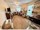 Bright office space with large window, hardwood floors, and plenty of storage at 138 Waddell Ln, Ridgeville, SC 29472