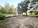 New wooden bridge leading to a charming house with a gazebo at 138 Waddell Ln, Ridgeville, SC 29472