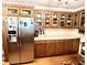 Kitchen with wood cabinets and stainless steel appliances at 138 Waddell Ln, Ridgeville, SC 29472