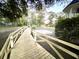 Wooden footbridge pathway leading to home at 138 Waddell Ln, Ridgeville, SC 29472