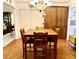 Bright dining room with wooden table and chairs at 138 Waddell Ln, Ridgeville, SC 29472