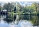 Riverfront property with two houses visible at 138 Waddell Ln, Ridgeville, SC 29472