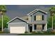 Two-story blue home with attached garage and front porch at 159 Morning View Way, Moncks Corner, SC 29461