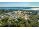 Aerial view of a coastal community with numerous houses near the water at 1714 Cultivation Ln # 537, Mount Pleasant, SC 29466