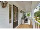 Front porch with rocking chairs and a view of the street at 1714 Cultivation Ln # 537, Mount Pleasant, SC 29466