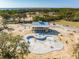 Aerial view of community pool and clubhouse under construction at 1714 Cultivation Ln # 537, Mount Pleasant, SC 29466