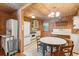 Rustic kitchen with white appliances and wood details at 712 W Ashley Ave, Folly Beach, SC 29439