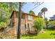 Unique beach cottage with screened porch and wood siding at 712 W Ashley Ave, Folly Beach, SC 29439