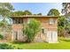 Wooden house with screened porch, and detached garage at 712 W Ashley Ave, Folly Beach, SC 29439
