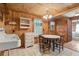 Rustic kitchen with white appliances and wood details at 712 W Ashley Ave, Folly Beach, SC 29439