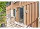 Exterior view of weathered wood siding, screened windows and door at 712 W Ashley Ave, Folly Beach, SC 29439