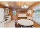 Rustic kitchen with white appliances and wood details at 712 W Ashley Ave, Folly Beach, SC 29439