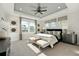 Spacious main bedroom with a king-size bed and a tray ceiling at 235 Claret Cup Way, Charleston, SC 29414