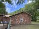 Brick home exterior showcasing a side view and basketball goal at 1056 Yorktown Dr, Charleston, SC 29412