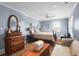Charming bedroom with antique furniture and a view at 118 E Ashley And 110 E Cooper Ave Ave, Folly Beach, SC 29439