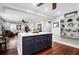 Open concept kitchen with a center island and built-in shelving at 118 E Ashley And 110 E Cooper Ave Ave, Folly Beach, SC 29439