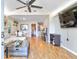 Open living room with hardwood floors and high ceilings at 118 E Ashley And 110 E Cooper Ave Ave, Folly Beach, SC 29439