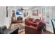 Relaxing living room with fireplace, built-in shelving, and comfortable seating at 118 E Ashley And 110 E Cooper Ave Ave, Folly Beach, SC 29439