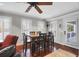 Charming dining room with hardwood floors and a wooden table at 118 E Ashley And 110 E Cooper Ave Ave, Folly Beach, SC 29439