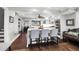Modern kitchen with white cabinets, a large island, and stainless steel appliances at 118 E Ashley And 110 E Cooper Ave Ave, Folly Beach, SC 29439
