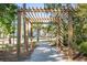 Wooden pergola over a walking path at 1647 Cultivation Ln # 451, Mount Pleasant, SC 29466