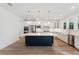 Elegant kitchen boasting white cabinets, quartz countertops, and stainless steel appliances at 1647 Cultivation Ln # 451, Mount Pleasant, SC 29466