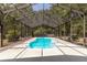 Inviting kidney-shaped pool with a screened enclosure at 964 Sandy Springs Cir, Walterboro, SC 29488