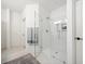 Spacious walk-in shower with white subway tile and glass enclosure at 420 Carolina Cherry Ct # 201, Charleston, SC 29414