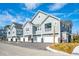 Townhomes with attached garages, balconies, and landscaping at 420 Carolina Cherry Ct # 201, Charleston, SC 29414
