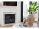 Elegant fireplace with marble surround, adding warmth and style at 1635 Cultivation Lane St # 448, Mount Pleasant, SC 29466