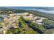 Aerial view of a new waterfront community with many houses under construction and a large body of water at 1635 Cultivation Lane St # 448, Mount Pleasant, SC 29466