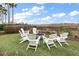 Relaxing fire pit area with seating, overlooking water at 252 Cooper River Dr, Mount Pleasant, SC 29464