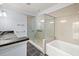 Bathroom with double vanity, soaking tub and walk-in shower at 252 Cooper River Dr, Mount Pleasant, SC 29464