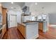 Modern kitchen with light wood cabinets, granite countertops, and stainless steel appliances at 252 Cooper River Dr, Mount Pleasant, SC 29464