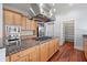 Updated kitchen with ample cabinetry, granite countertops and stainless steel appliances at 252 Cooper River Dr, Mount Pleasant, SC 29464