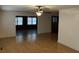 Bright living room featuring hardwood floors and a view into a sunroom at 208 Holly Rd, Walterboro, SC 29488