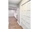 Spacious basement with built-in shelving and hardwood floors at 401 Constance St, Walterboro, SC 29488