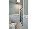 Clean bathroom with a tiled shower and marble-look flooring at 401 Constance St, Walterboro, SC 29488