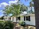 Charming brick ranch home with a newly landscaped yard at 401 Constance St, Walterboro, SC 29488