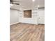 Bright Gathering room featuring built-in shelving and hardwood floors at 401 Constance St, Walterboro, SC 29488