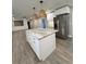Modern kitchen with stainless steel appliances and granite island at 401 Constance St, Walterboro, SC 29488
