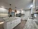 Stylish kitchen featuring white shaker cabinets and granite countertops at 401 Constance St, Walterboro, SC 29488