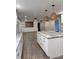 Open concept kitchen boasting a large island and granite countertops at 401 Constance St, Walterboro, SC 29488
