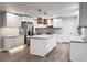 Newly renovated kitchen with white cabinets and granite countertops at 401 Constance St, Walterboro, SC 29488