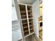 Updated kitchen with white cabinets and ample shelving at 401 Constance St, Walterboro, SC 29488