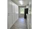 Modern kitchen with white cabinets, granite countertops, and stainless steel appliances at 401 Constance St, Walterboro, SC 29488
