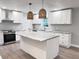Updated kitchen with white cabinets, granite countertops and stainless steel appliances at 401 Constance St, Walterboro, SC 29488